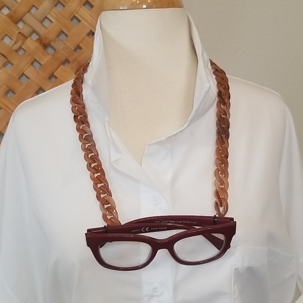 Funky glasses or mask chain.